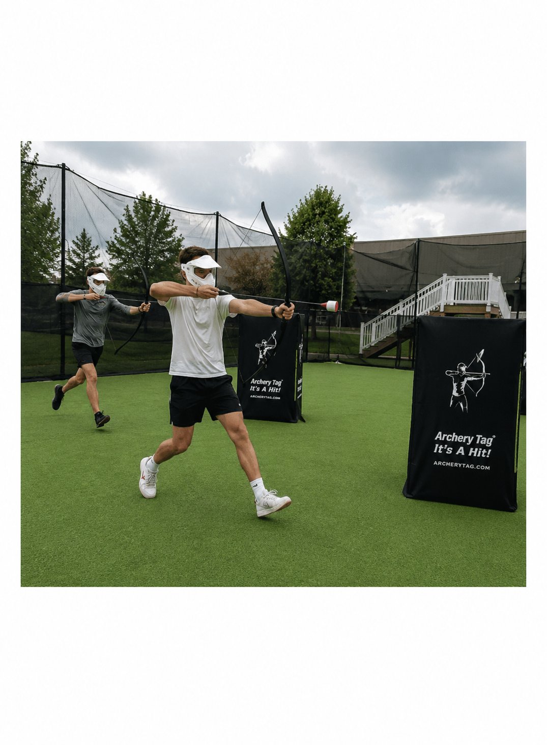 Player firing a foam-tipped arrow during Archery Tag at Trick Shot X